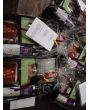 Delicious Spanish food gift package with olives, cheese and serrano ham.