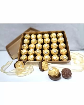 Ferrero Rocher chocolate , send gaver, bursdagsgaver, gaver på døra, julegaver matkurv, matgaver til jul, julegaver firma. julegaver til personalet, julegaver til ansatte, julegaver sjokolade, julegaver ansatte,